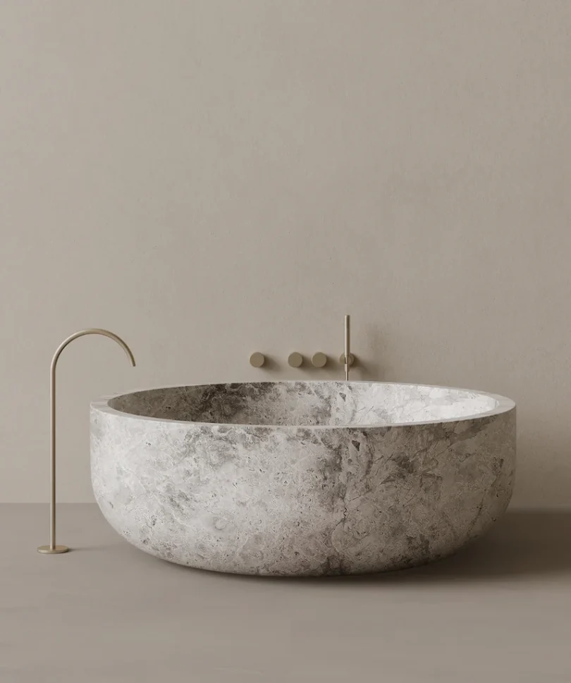 Bañera redonda de piedra gris Mushin TSUKI para proyectos de interiorismo y baños de diseño contemporáneo en Madrid